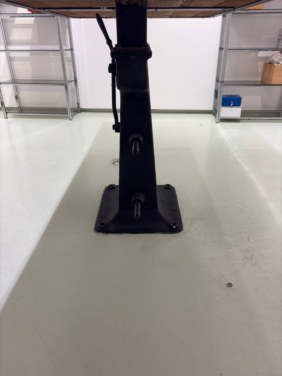 Industrial table with cast iron legs.