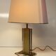 Table lamp in lucite and brass in Hollywood Regency style from the 70s.