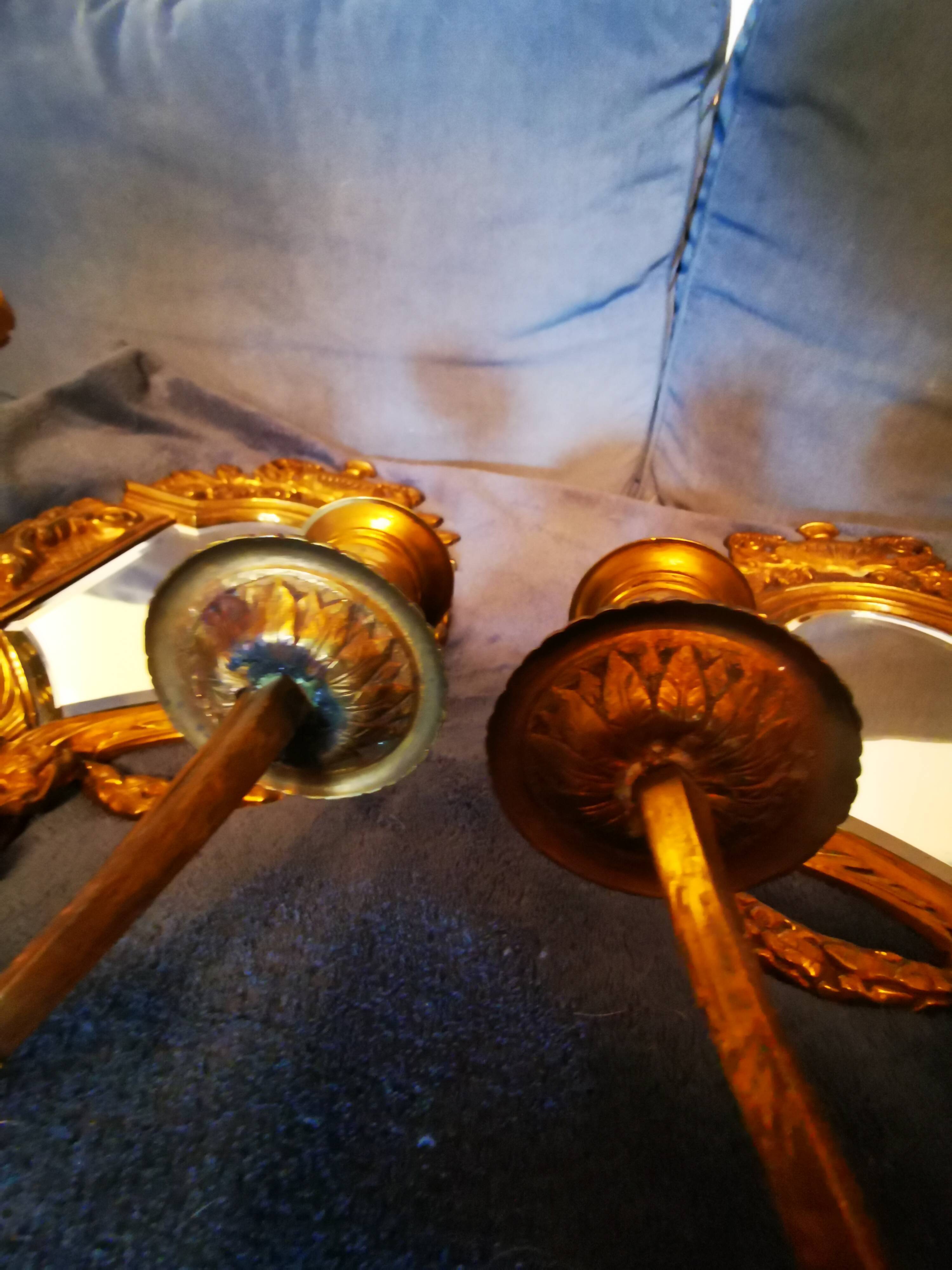 Pair of chissed and gilded bronze mirrors forming appliques