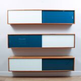 Vintage mid-century wall hung oak cabinets, blue & white sliding glass door