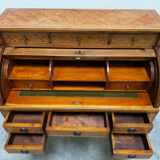 Cylinder desk with marquetry featuring a crosshatch design.