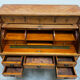 Cylinder desk with marquetry featuring a crosshatch design.