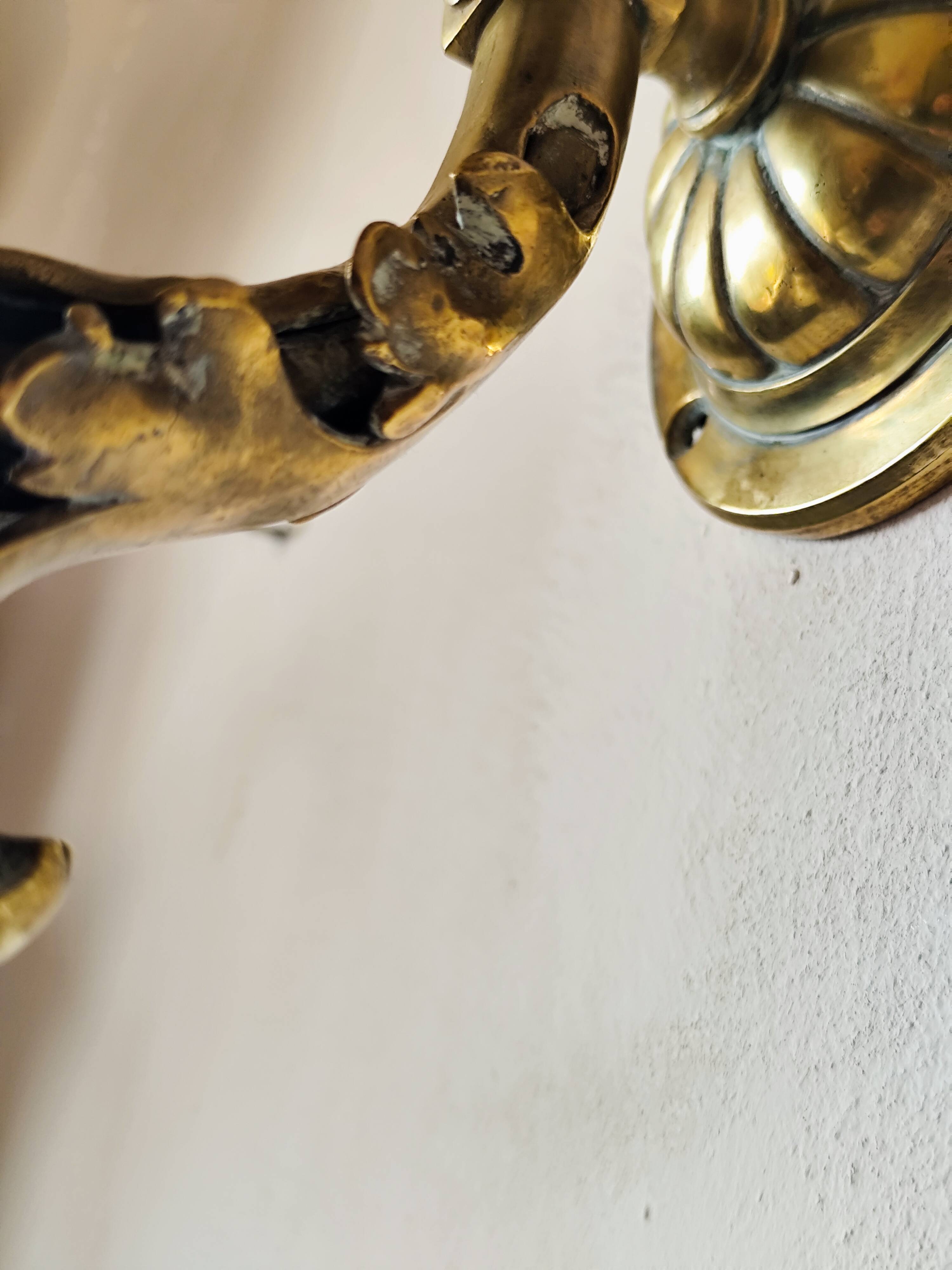 Bronze wall light with opaque glass tulip