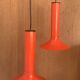 Pair of Lita metal orange pendant lights from the 70s Space Age.