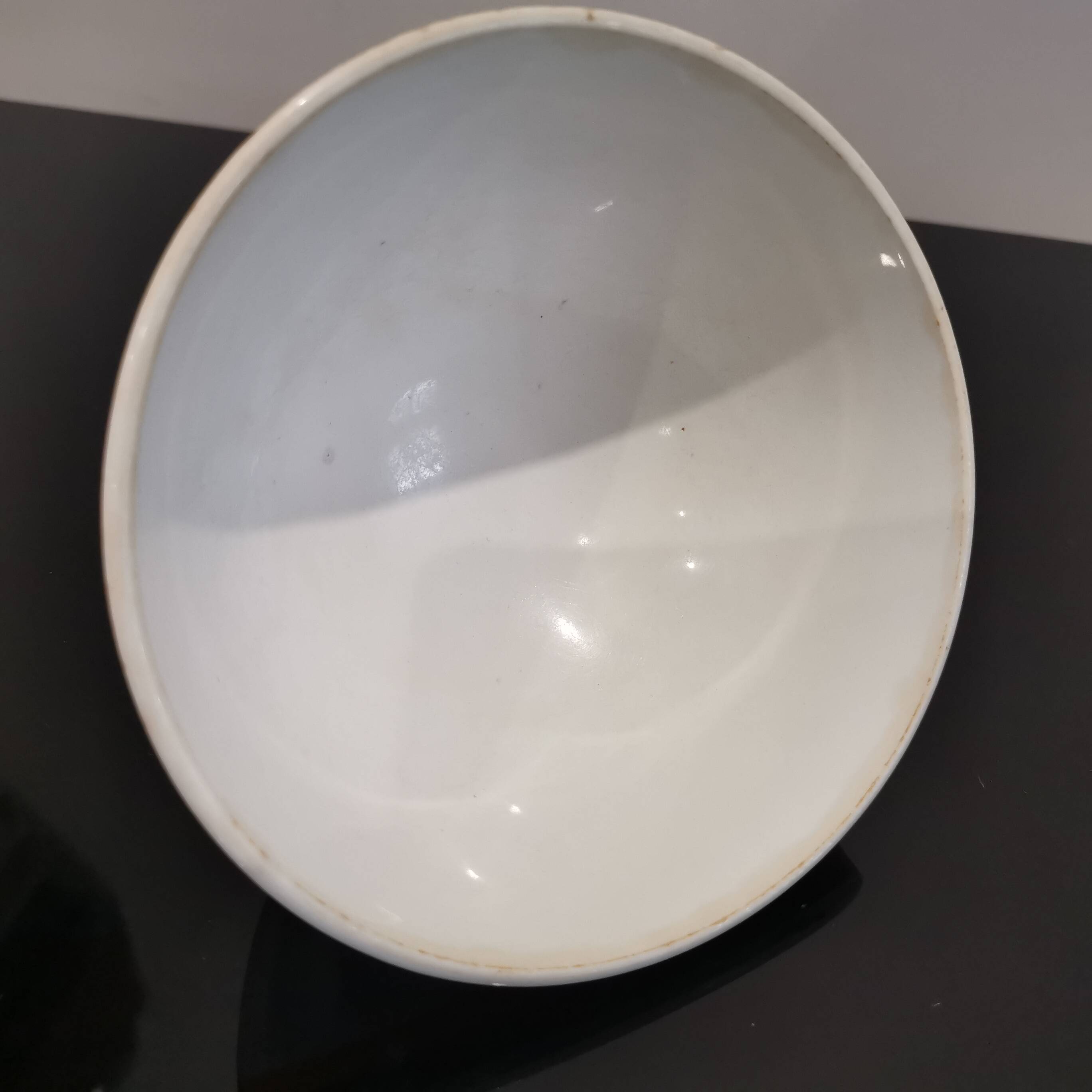 Authentic Vintage ceramic faceted bowl decorated with a double border