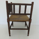 Corner chair in turned wood and straw