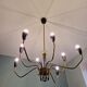 Spider chandelier in brass and black lacquered metal Italian design 1950s