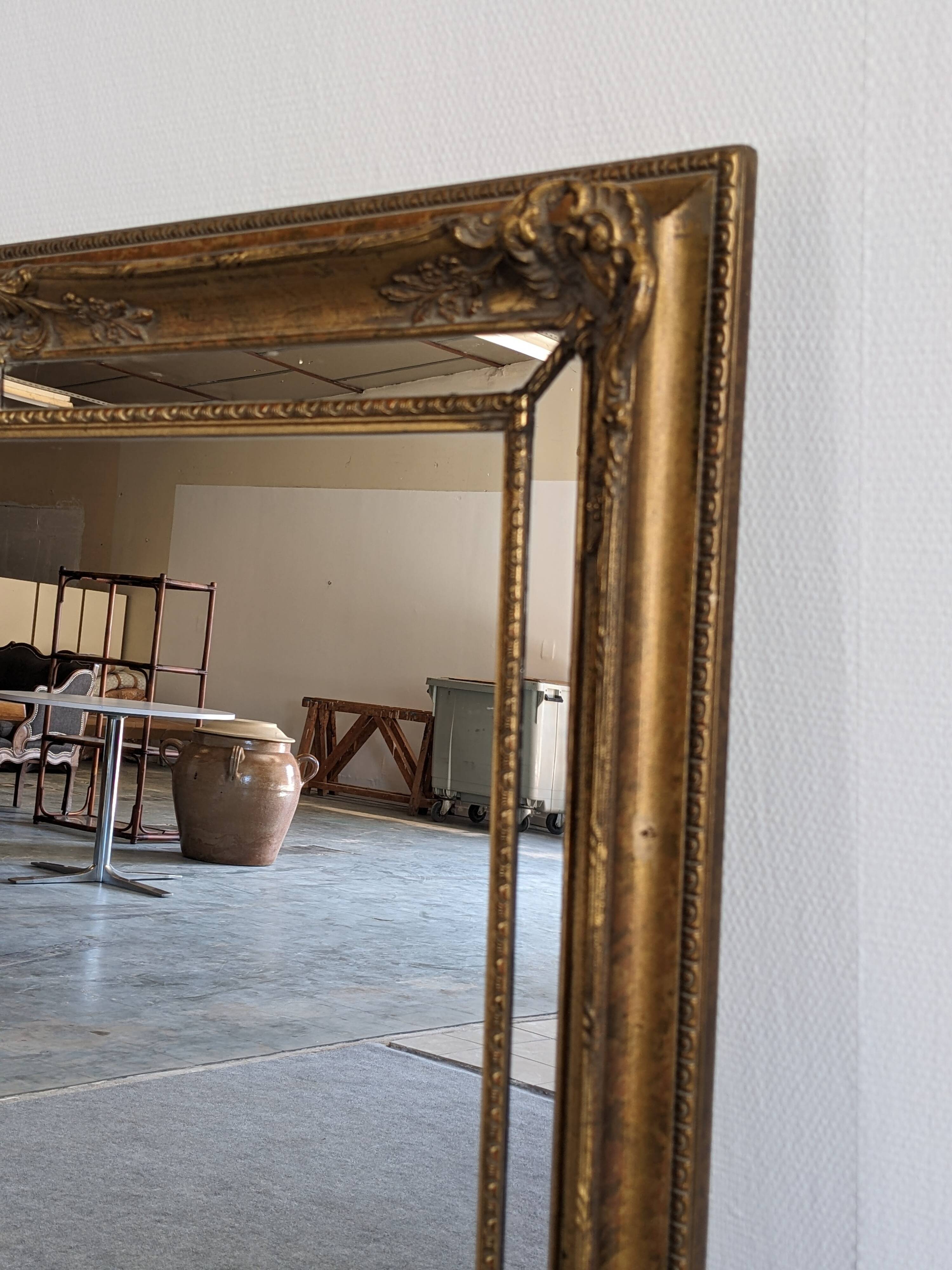 Louis XV style beaded mirror in gilded wood 115x85 cm