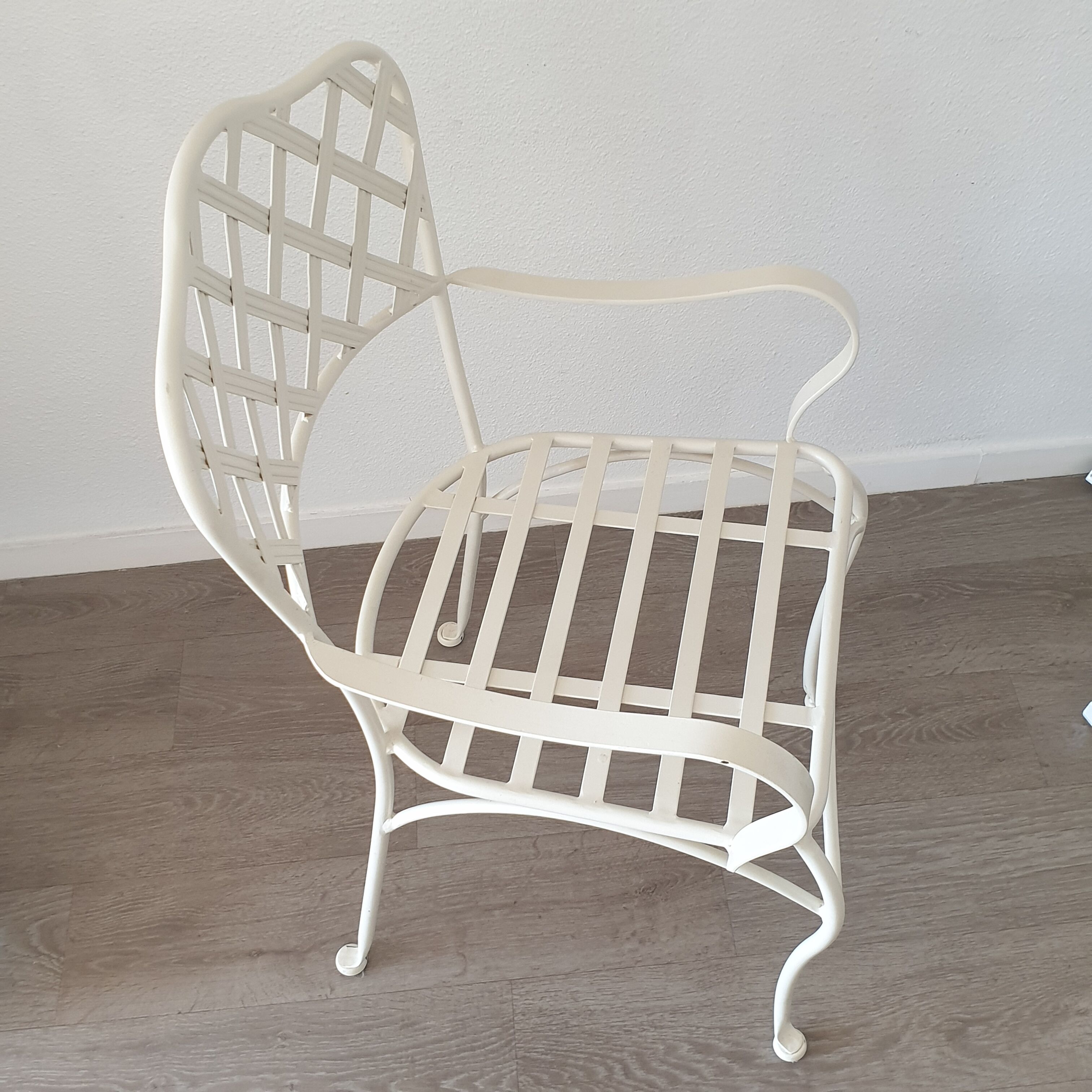 White wrought iron chair garden