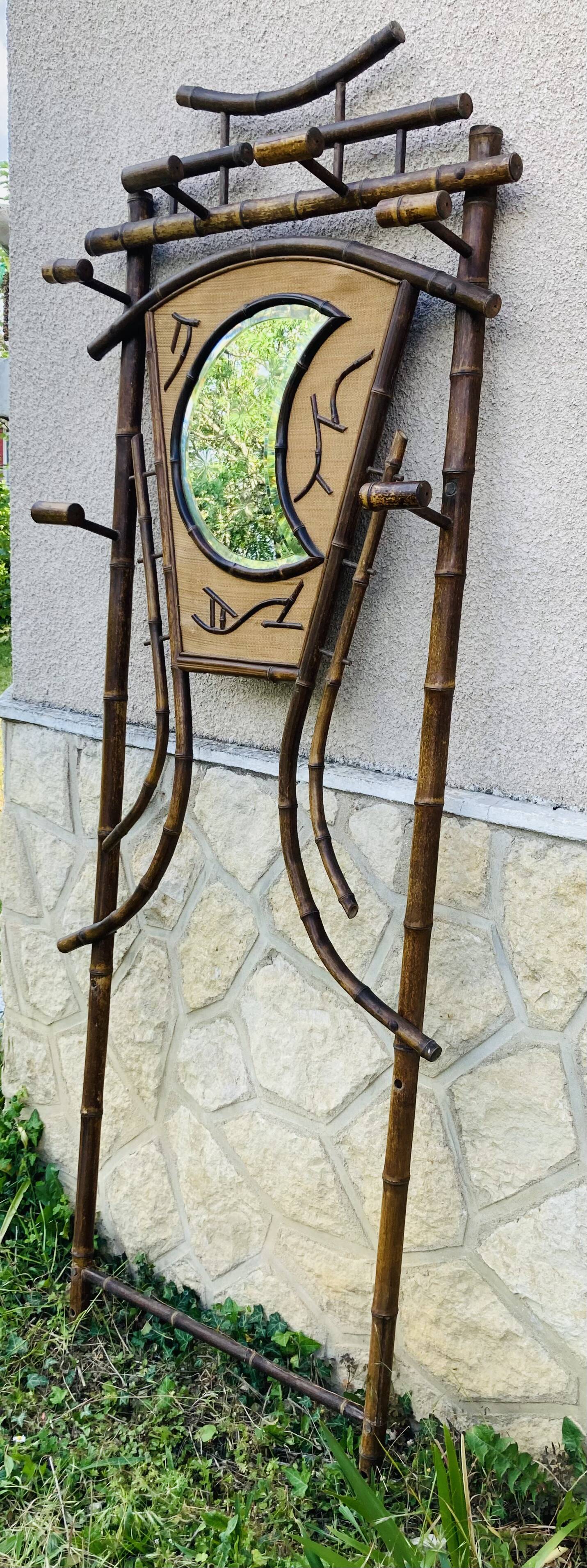Bamboo coat rack from the 19th century, mirror in the shape of a crescent moon.