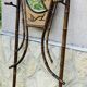 Bamboo coat rack from the 19th century, mirror in the shape of a crescent moon.