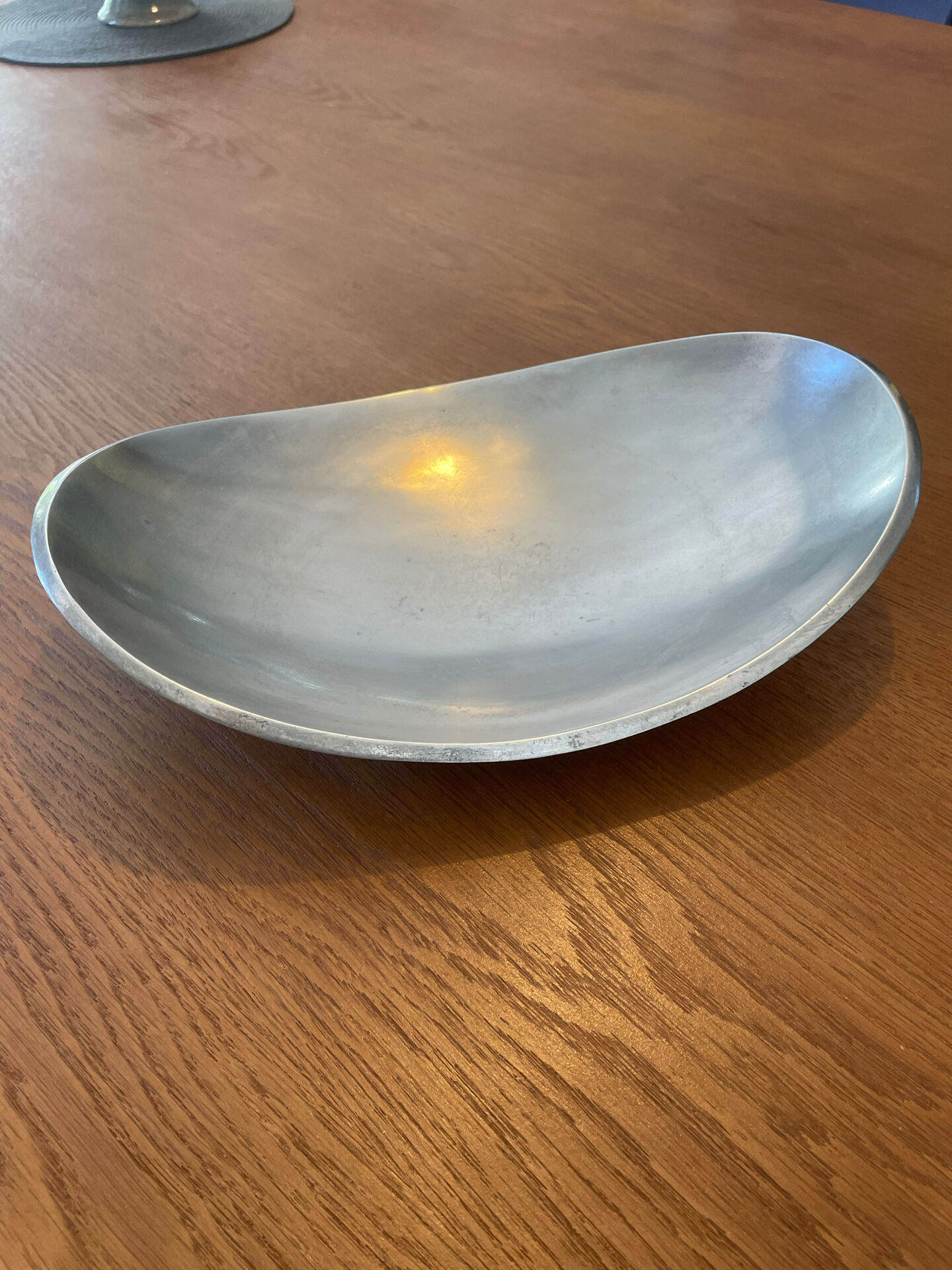 Elegant forged aluminium catchall.