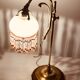Old lamp adjustable on foot tulip golden brass.