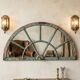 Old wrought iron full riveted gates from the 19th century.