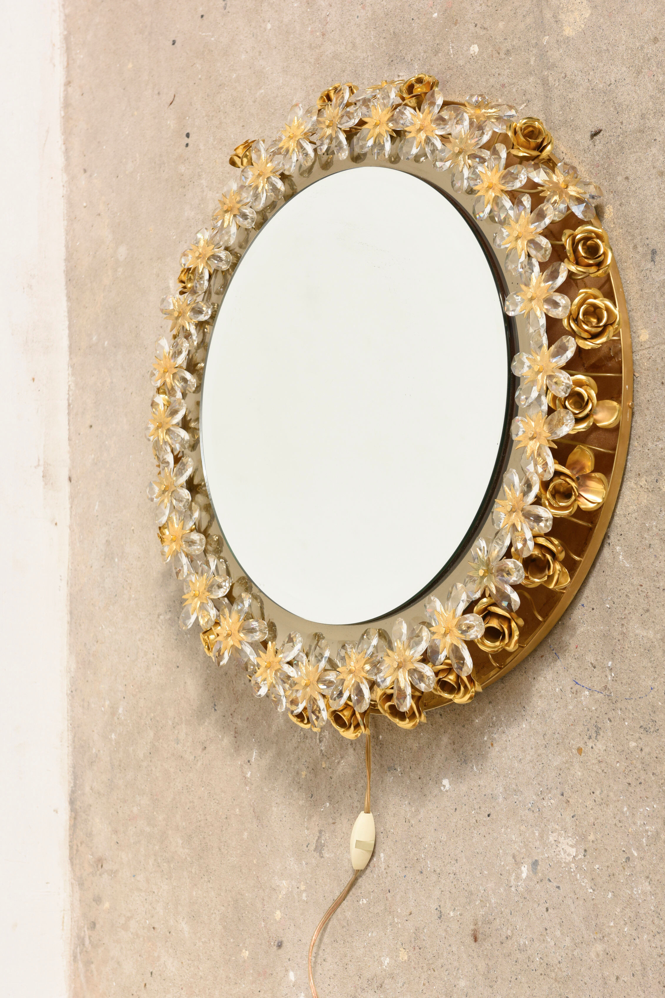 Brass illuminated mirror Made by Palwa, Germany with original label. The large individual