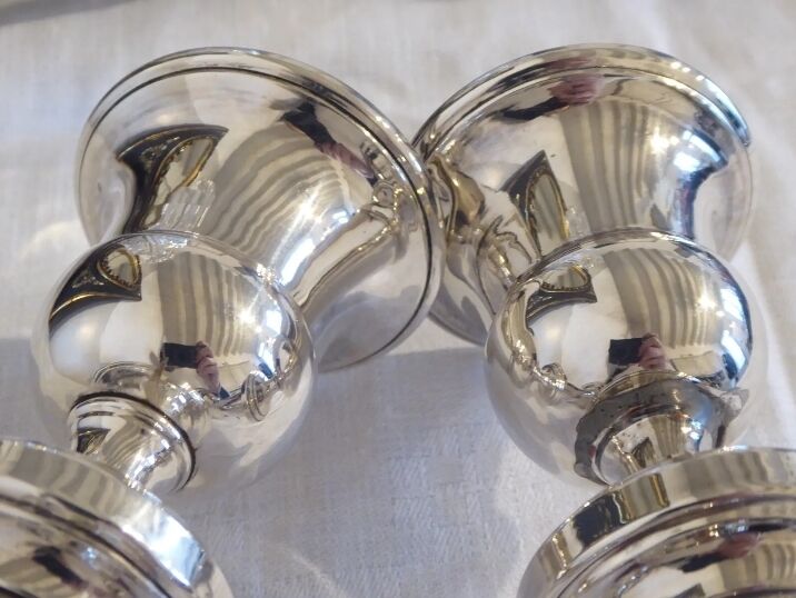 Pair of silver metal candle holders