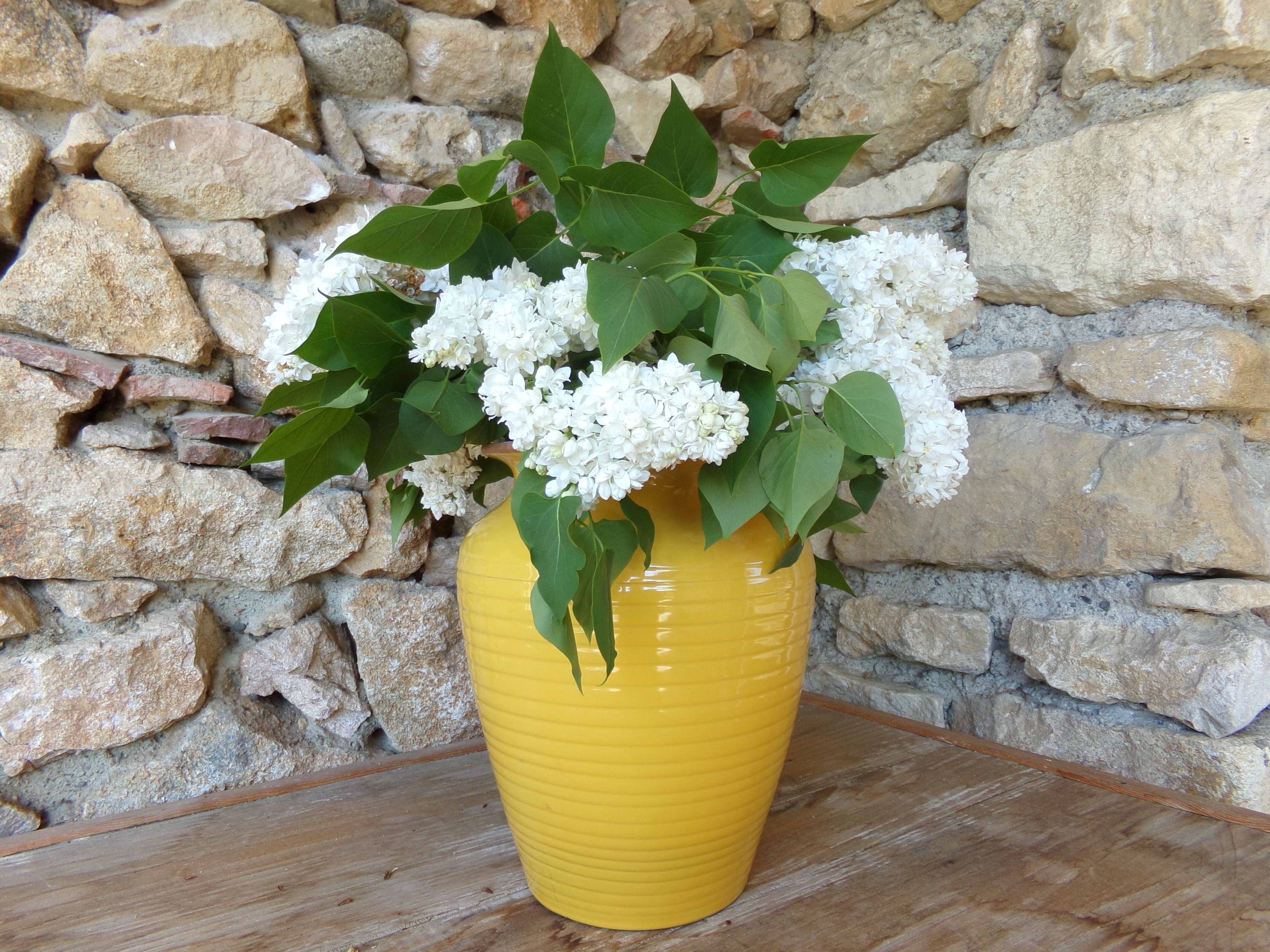 Yellow glazed earth vase