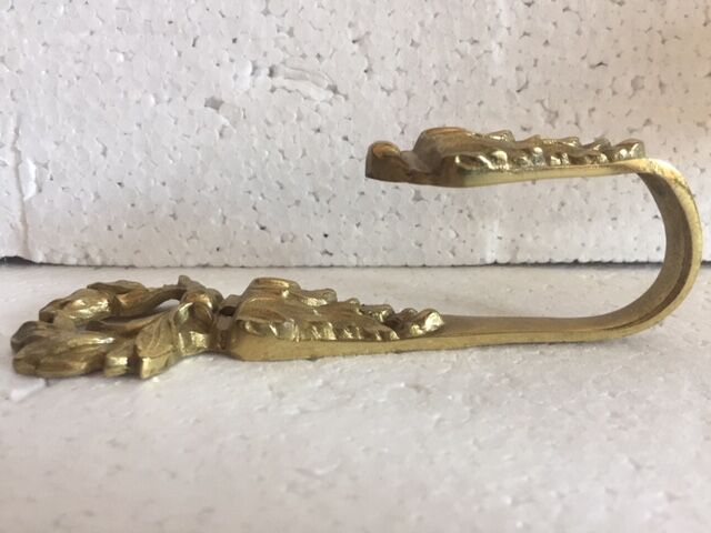 Former bronze patère