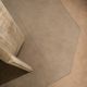 Dining table in travertine and smoked glass.