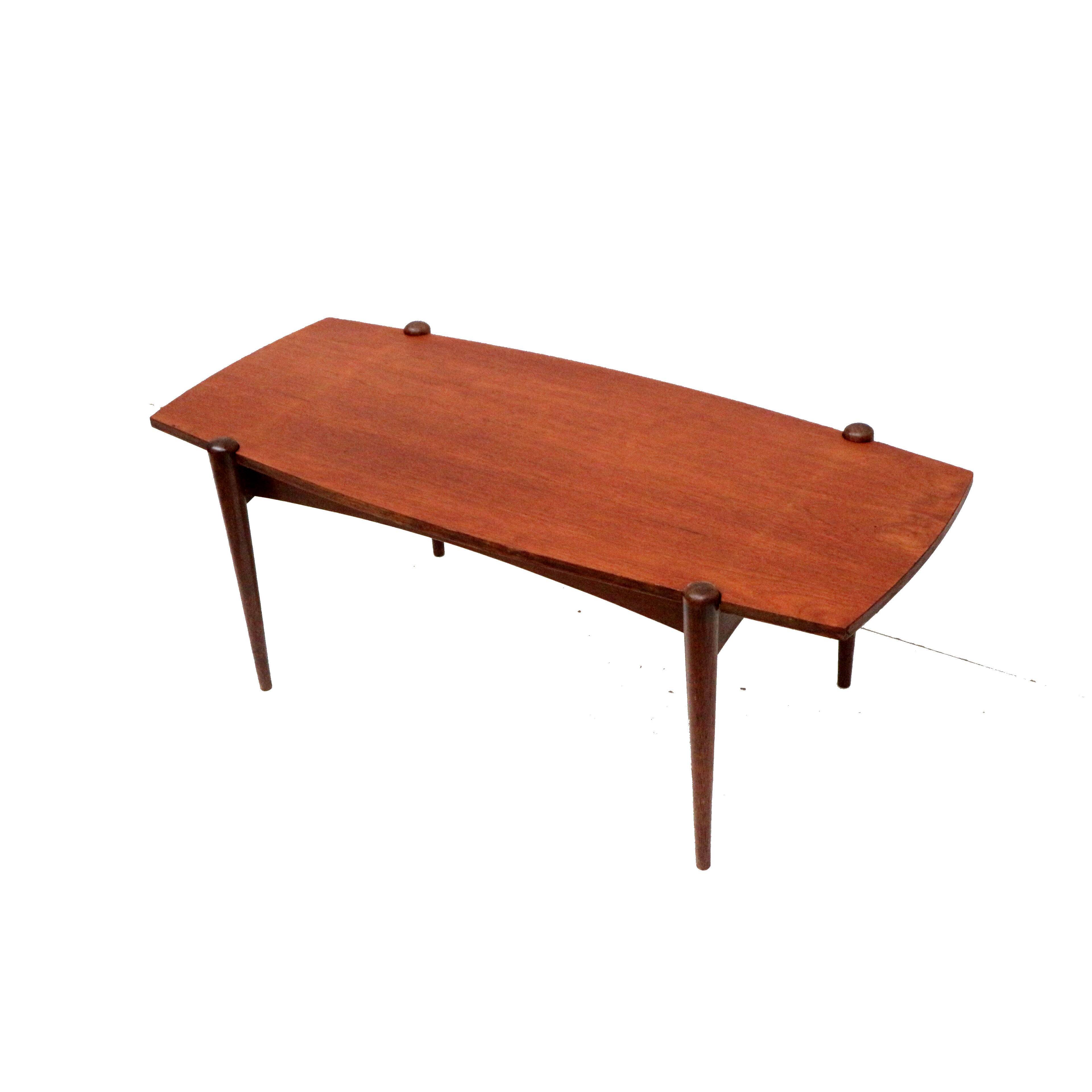 Vintage coffee table with reversible teak and formica top from the 60s