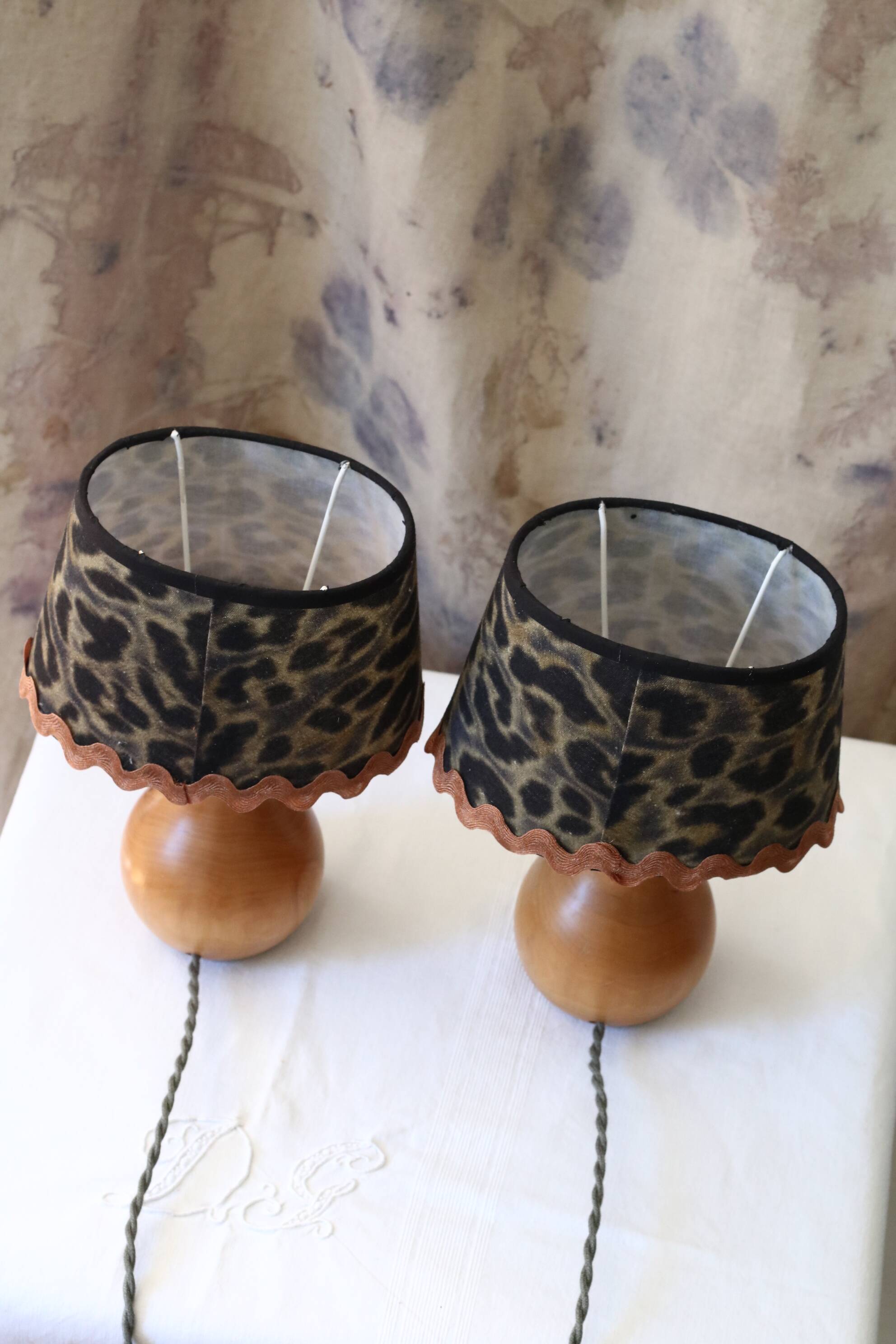 Pair of pear wood bedside lamps with leopard shades