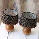 Pair of bedside lamps in pear wood with leopard shade.