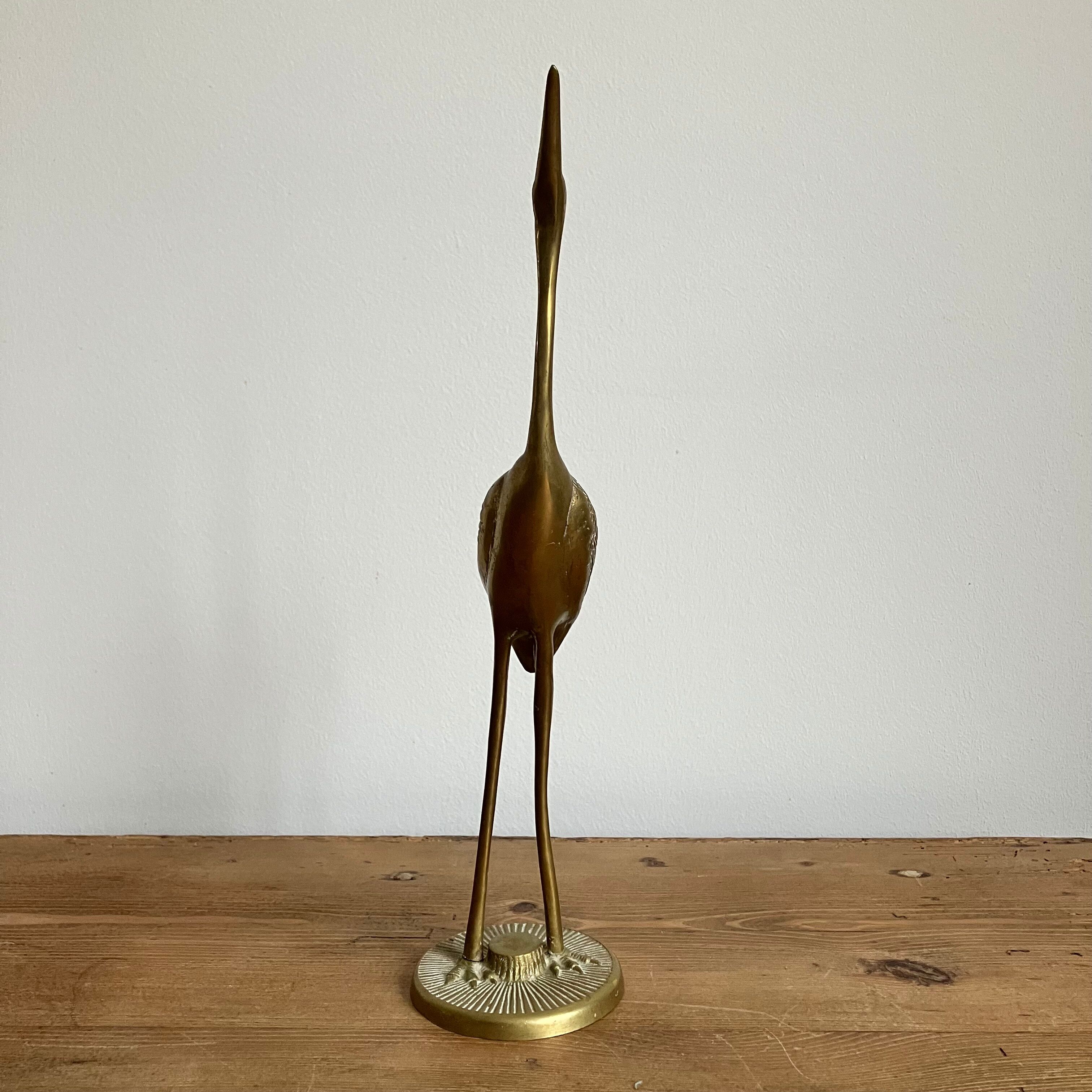 Brass heron