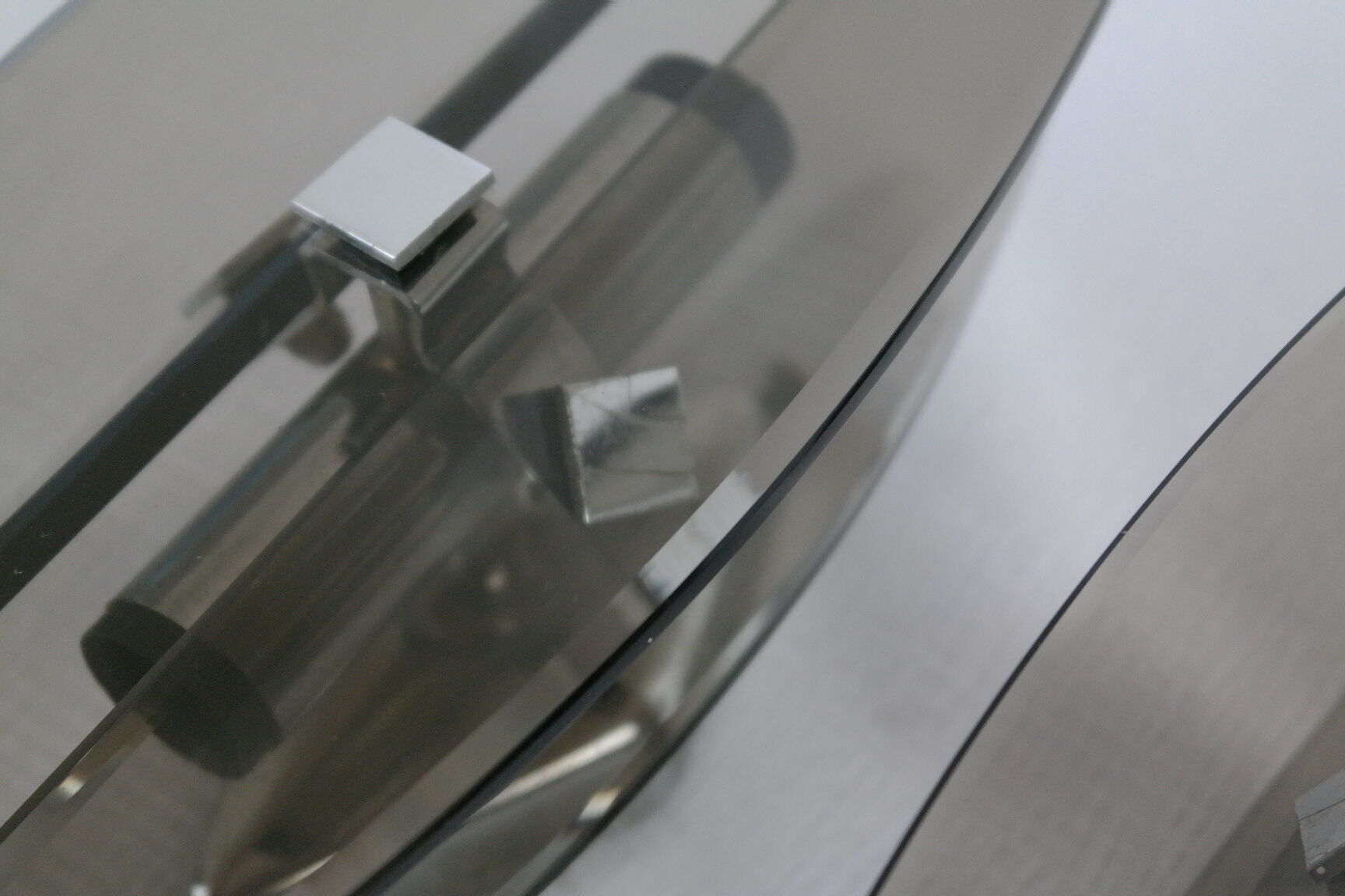 Pair of smoked glass and vintage chrome wall lamps