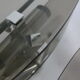 Pair of smoked glass and vintage chrome wall lamps