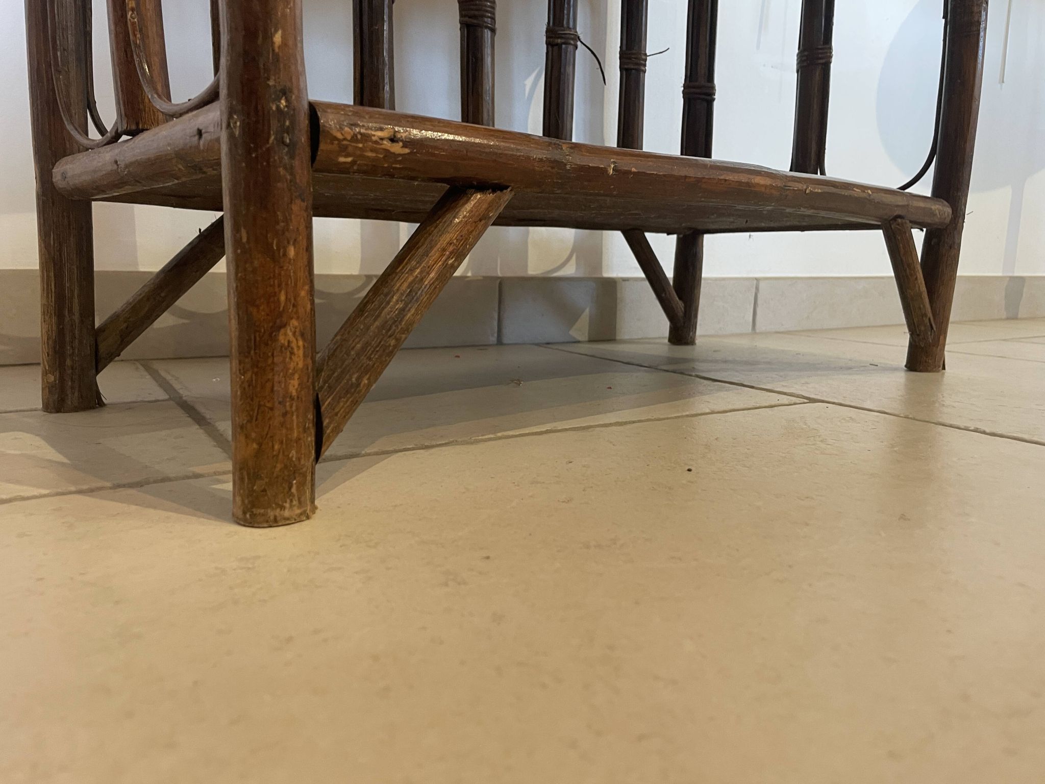 Shelf on rattan and bamboo legs from the 70s