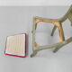 Dining chair upholstered with stamped tin