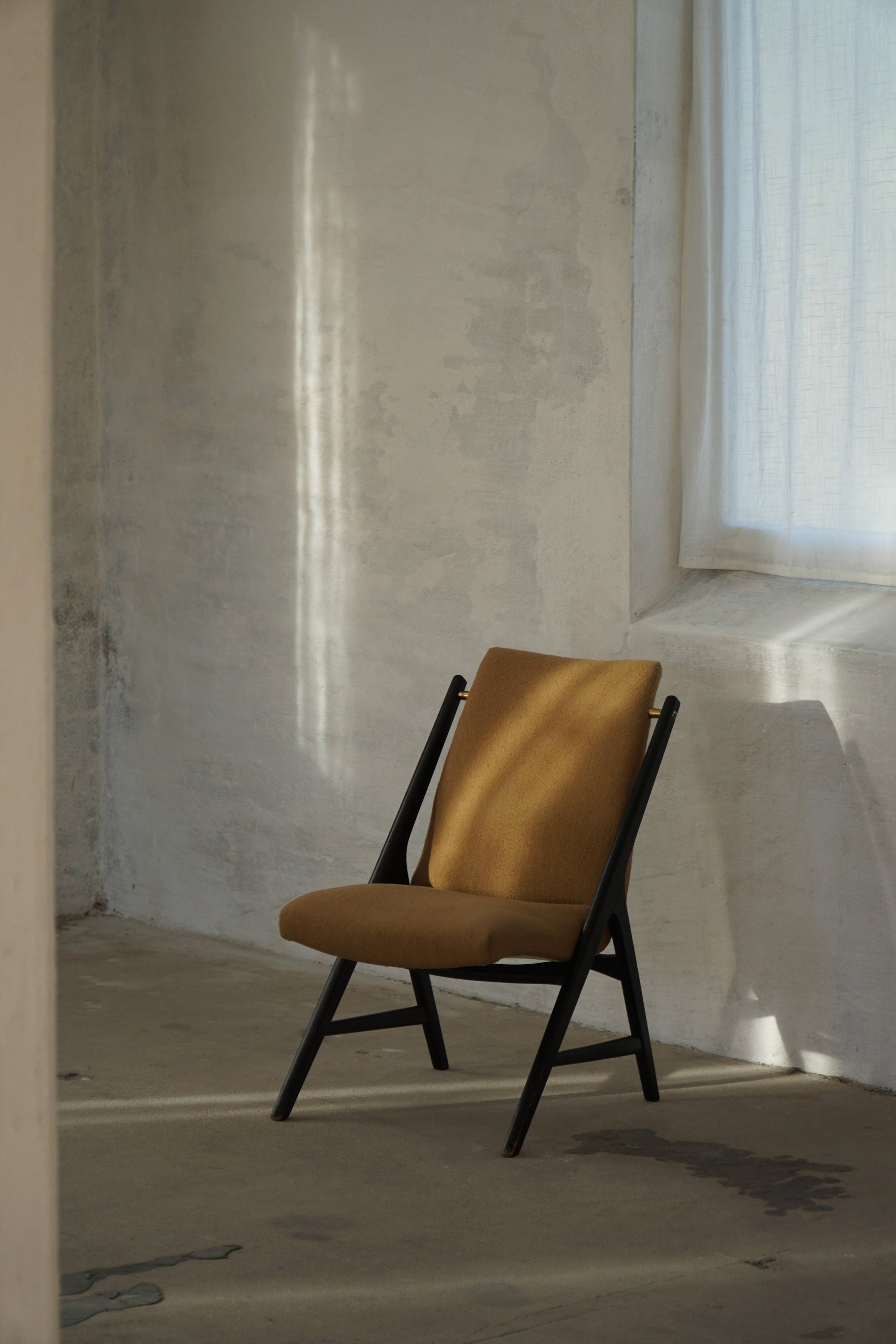 Pair of armchairs from the 50s-60s in boucle, mid-century Swedish design.