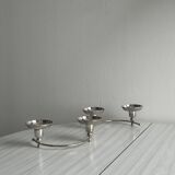 Shiny stainless steel candlestick holder