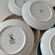 Set of 7 porcelain plates, gold foliage & jungle
