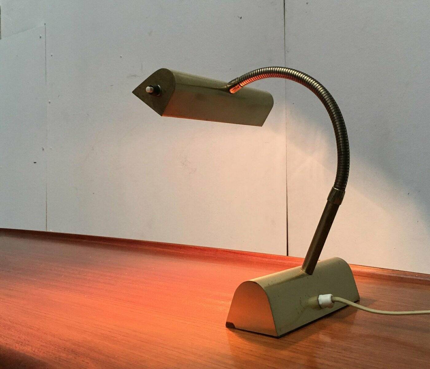 Mid-century brass swan neck table lamp in Hollywood Regency style from the 1960s.