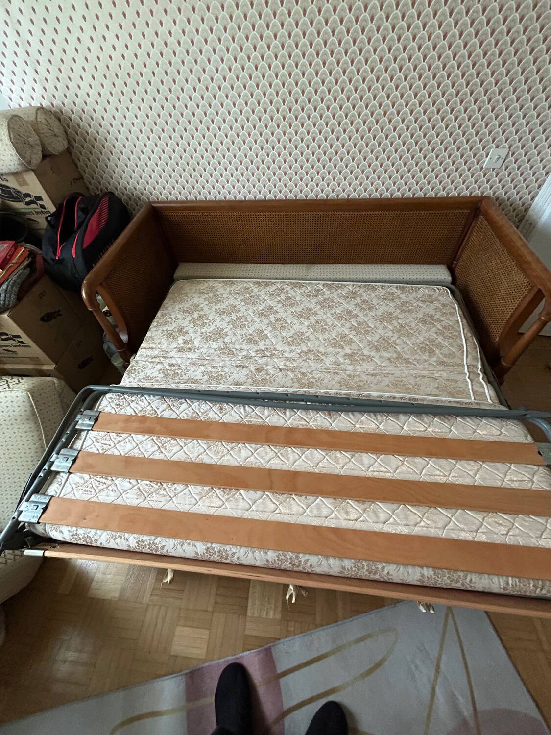 Vintage convertible wooden and cane sofa