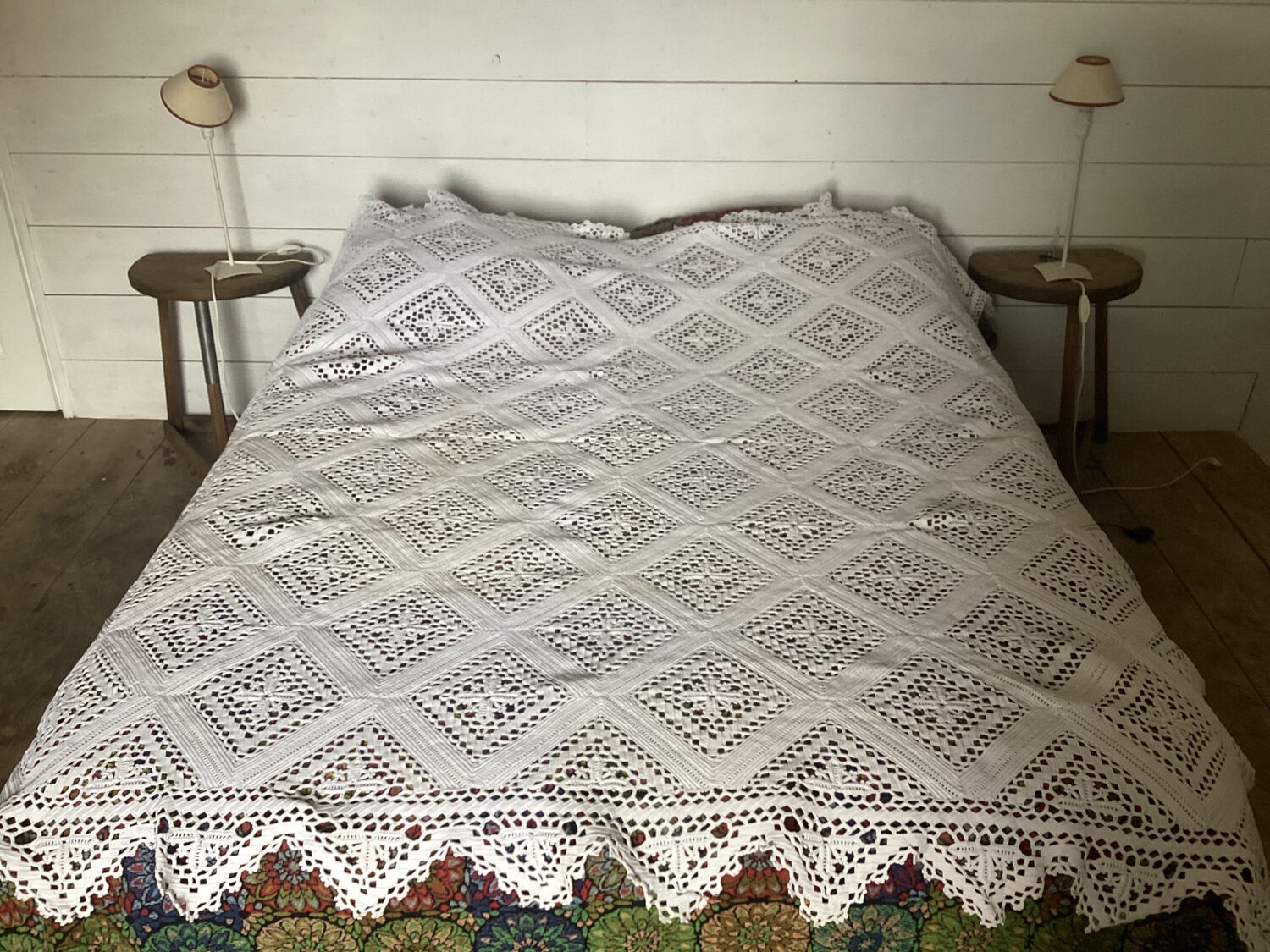 White cotton crochet bedspread with diamonds