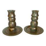 Pair of green and gold wooden candlesticks