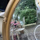 Bevelled oval mirror in vintage gilded wood 46x62cm