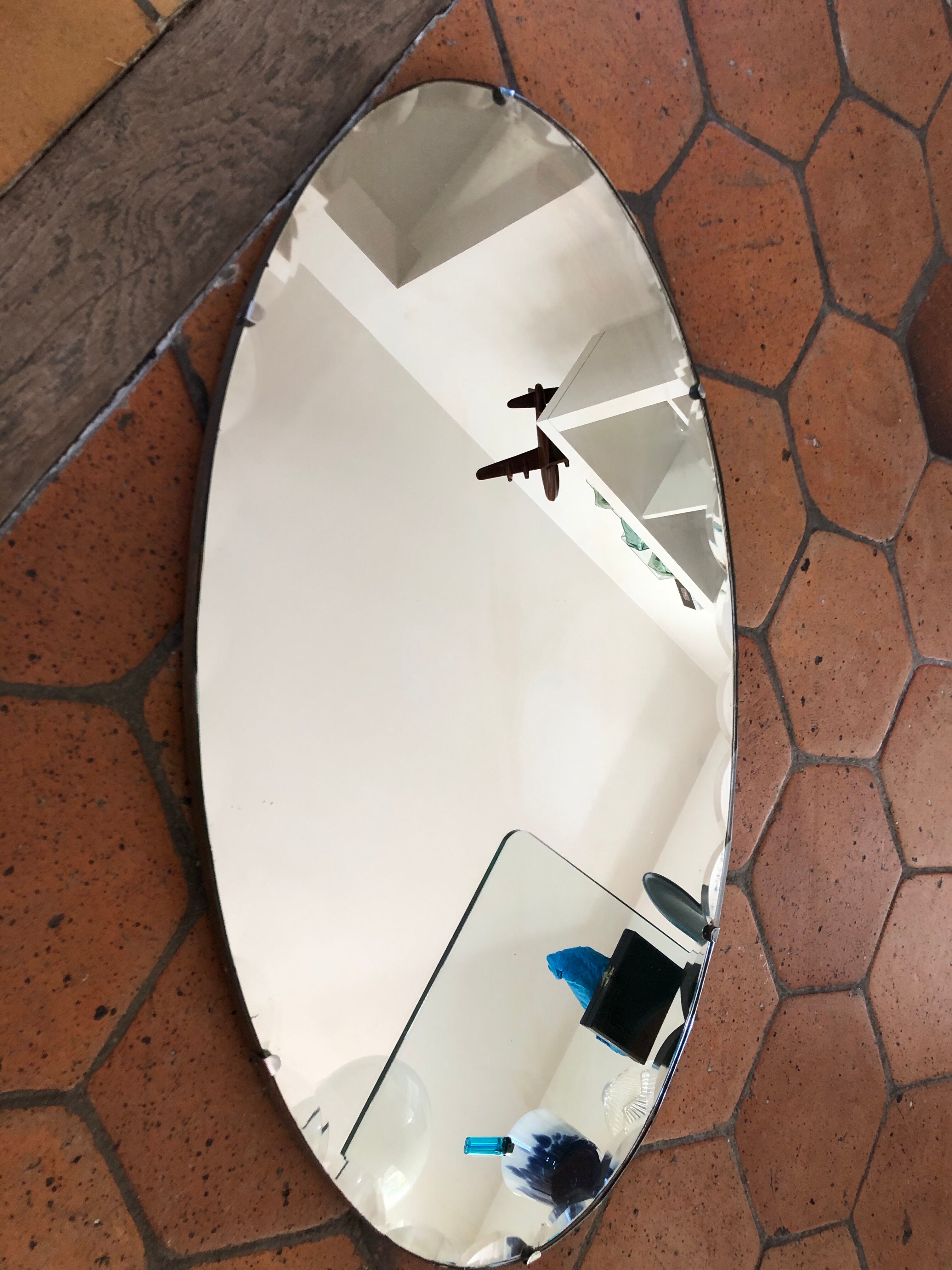 Bevelled art deco oval mirror mounted on wood with vertical or horizontal original chain 38x68cm