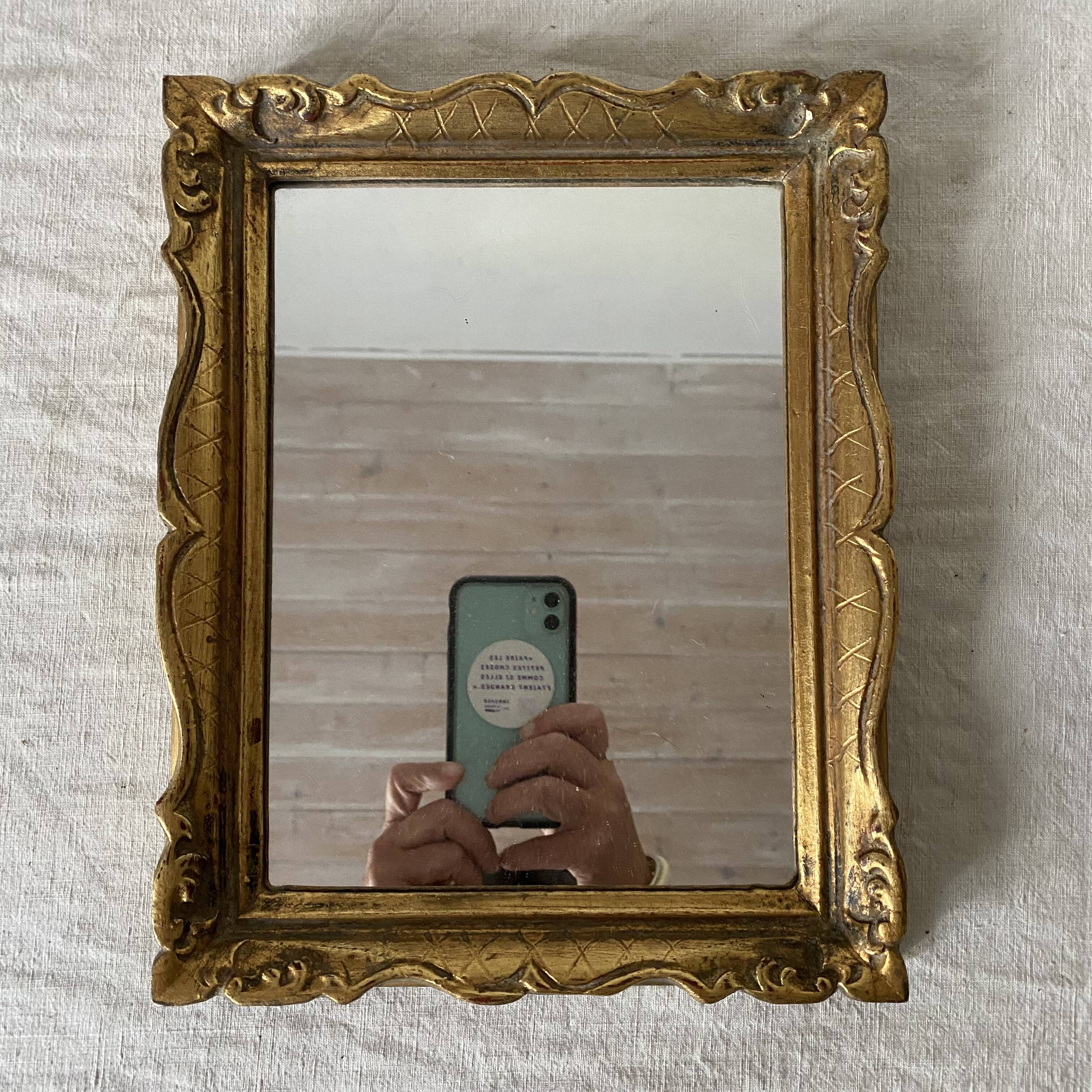 Small molded gilded mirror