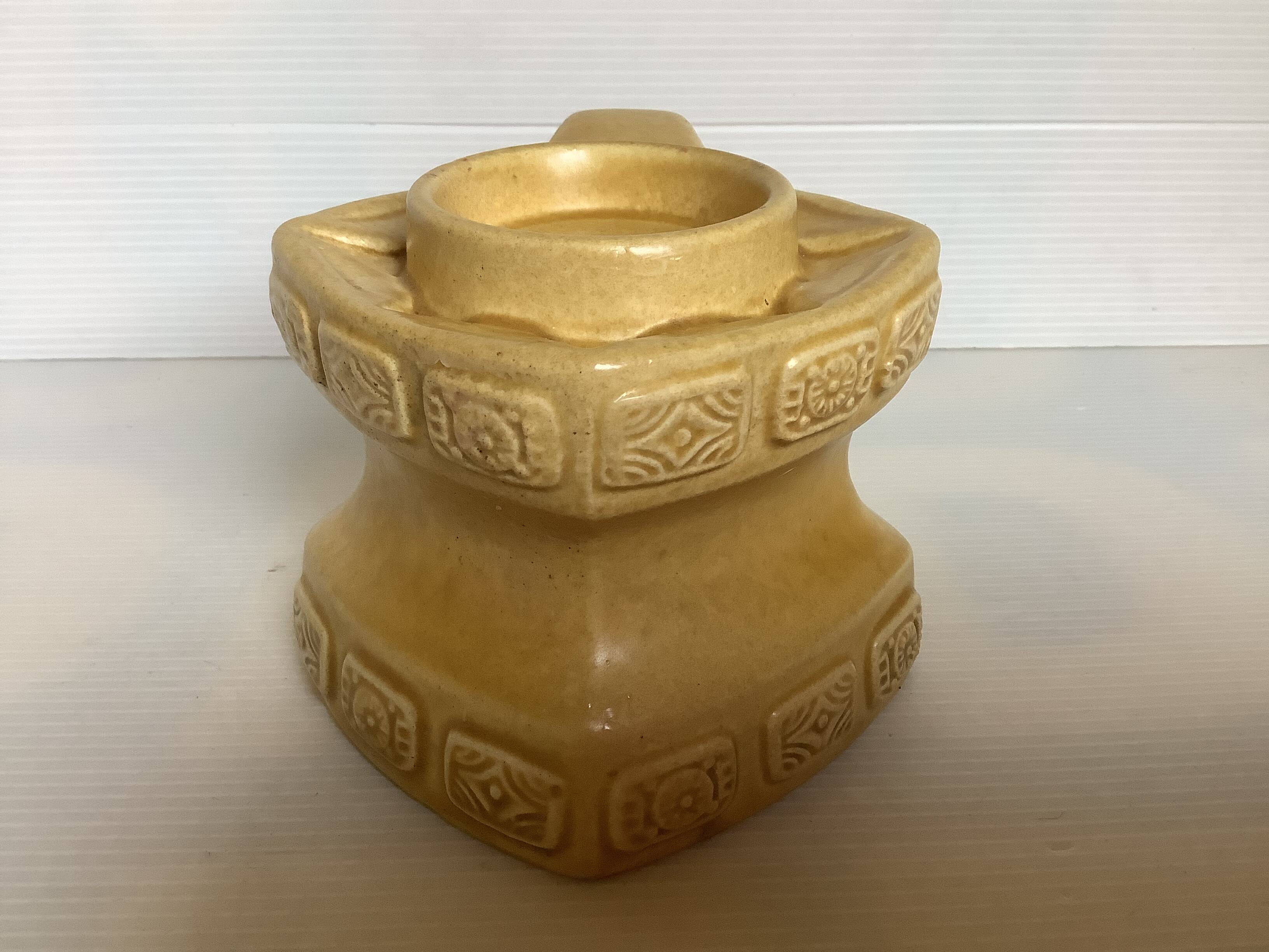 Ochre ceramic geometric-shaped candlestick