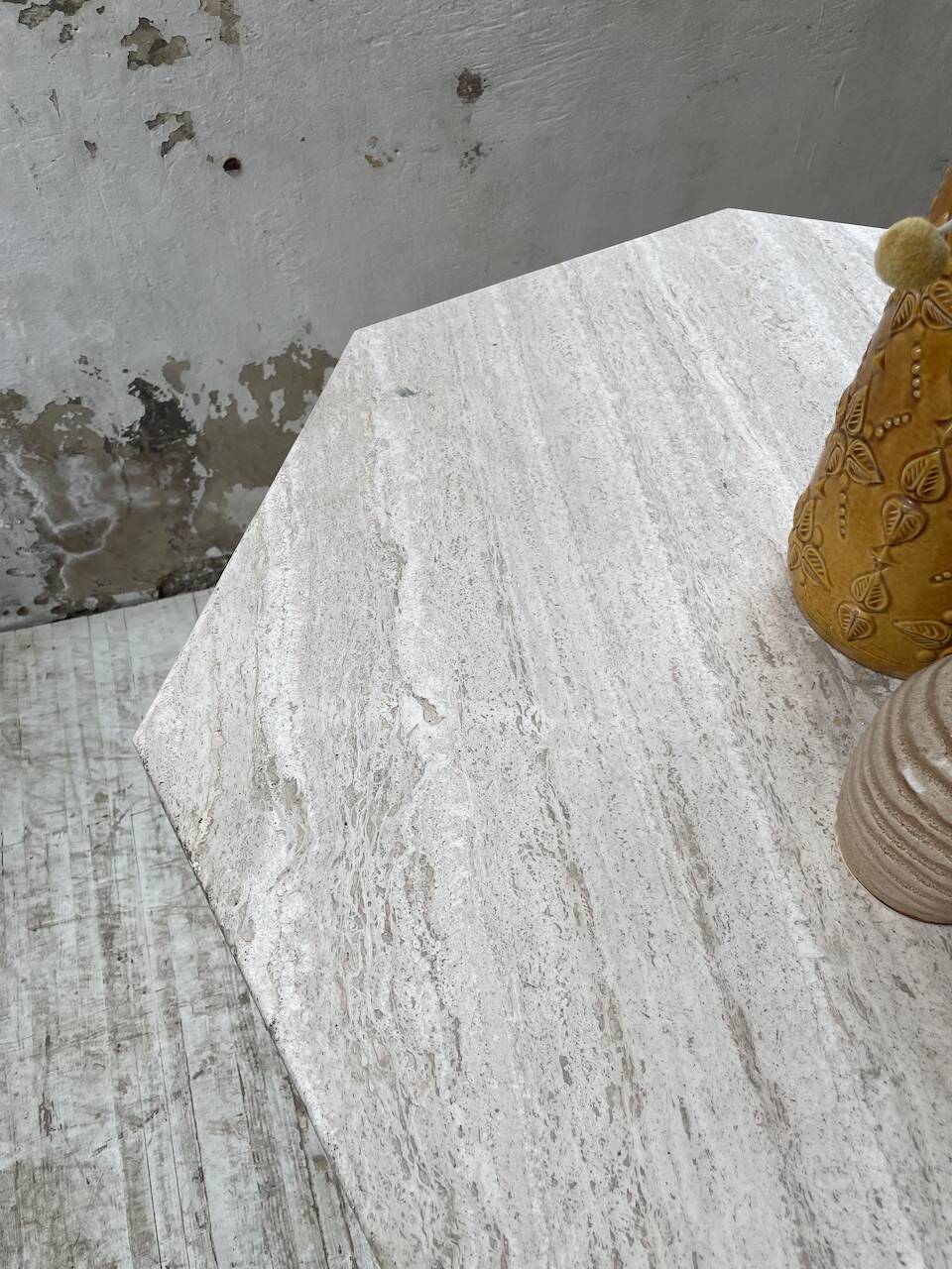 Octagonal travertine coffee table