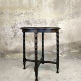 Vintage gueridon with beaded wooden legs.