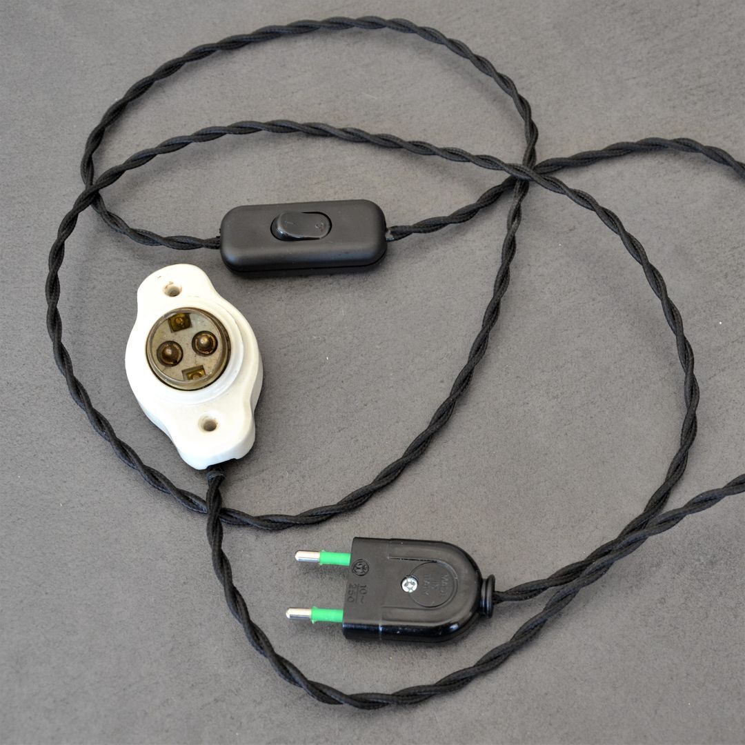 Oval porcelain hook to plug into socket