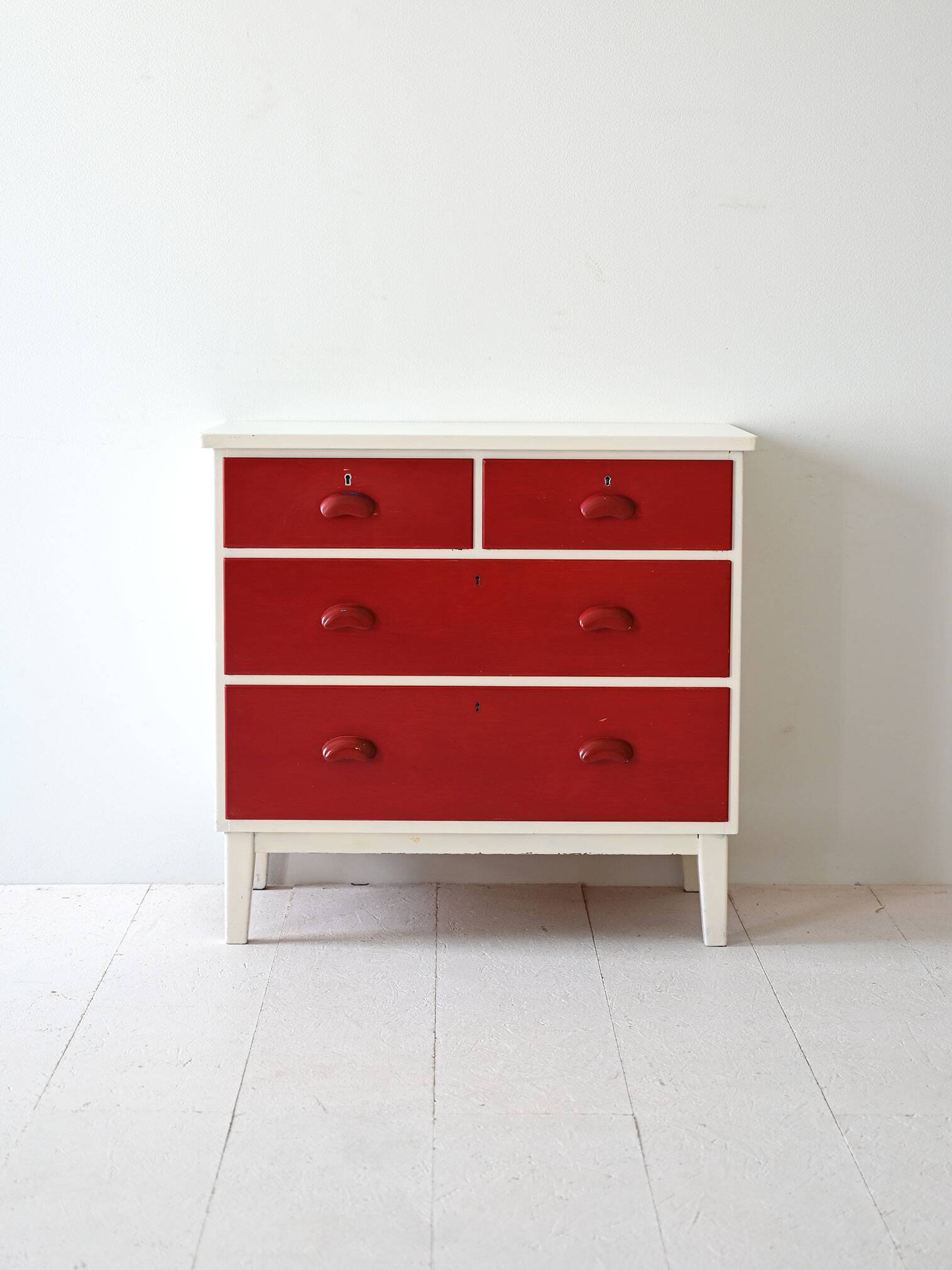 Vintage lacquered wood chest of drawers
