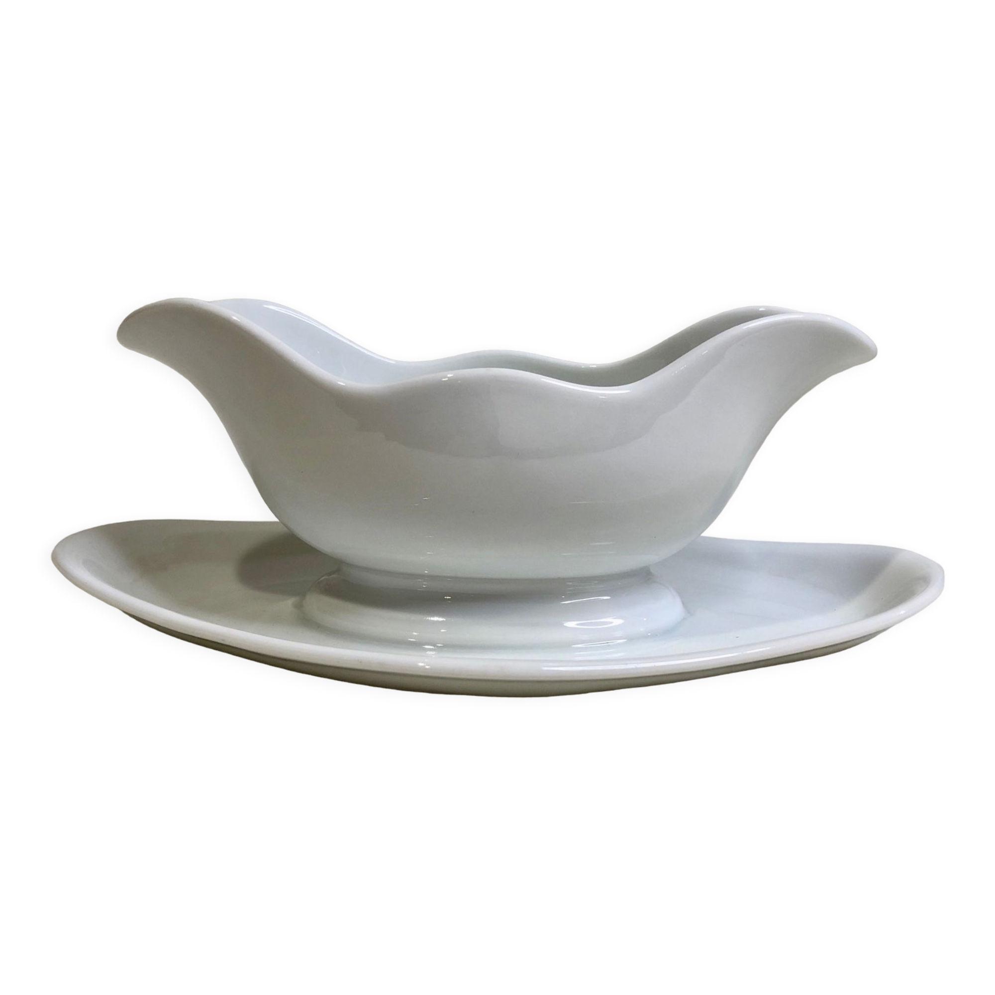 Saucière en porcelaine blanche. AH & C, France.