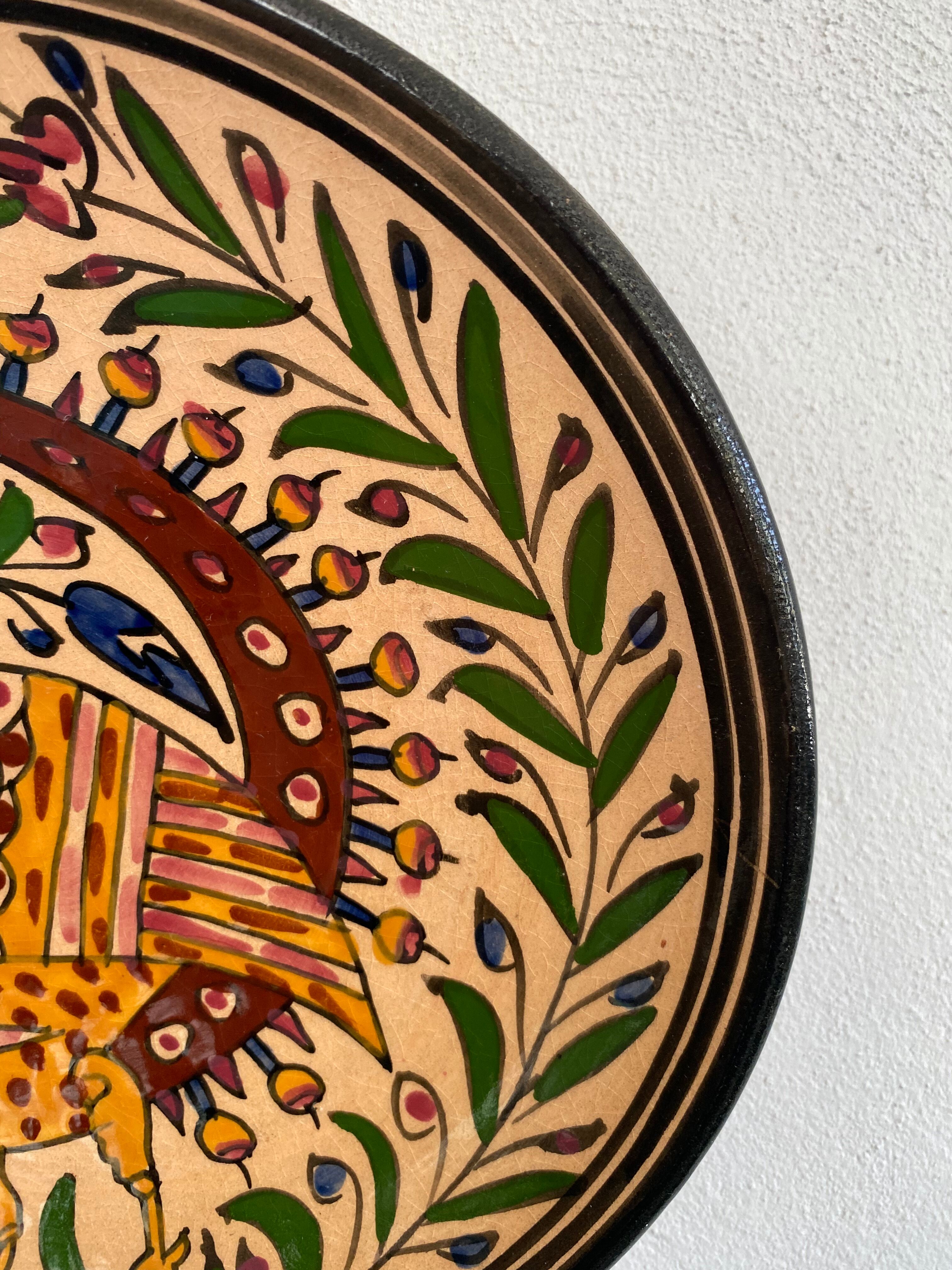 Glazed ceramic decorative plate