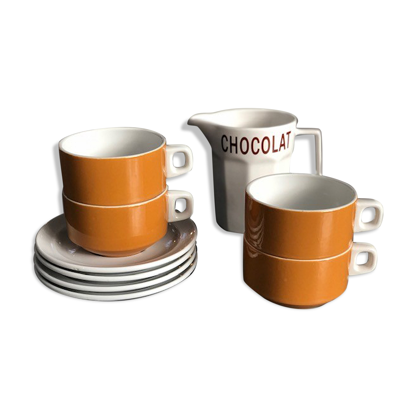 Hot chocolate cups and milk jar
