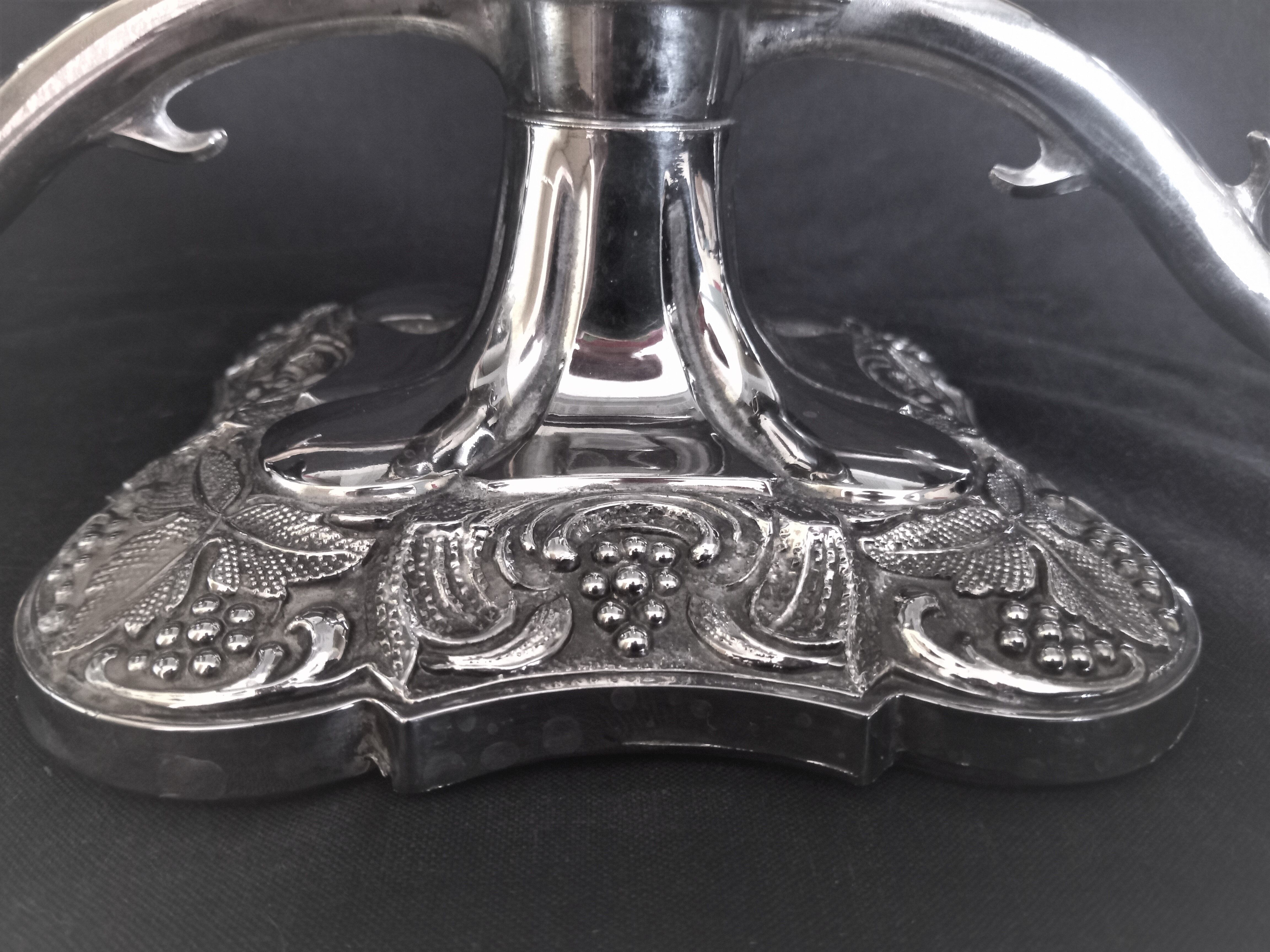 Candlestick in silver metal